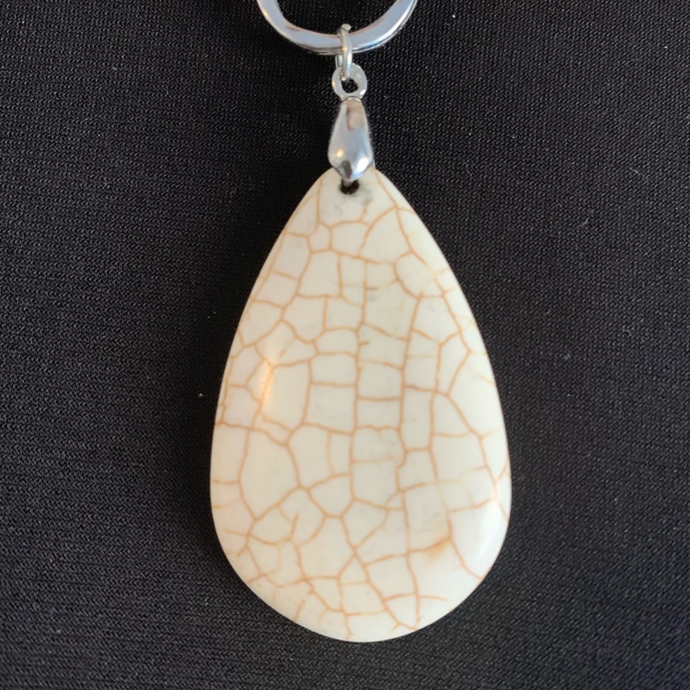 Beautiful necklace that lays just perfectly. Beautiful stone.